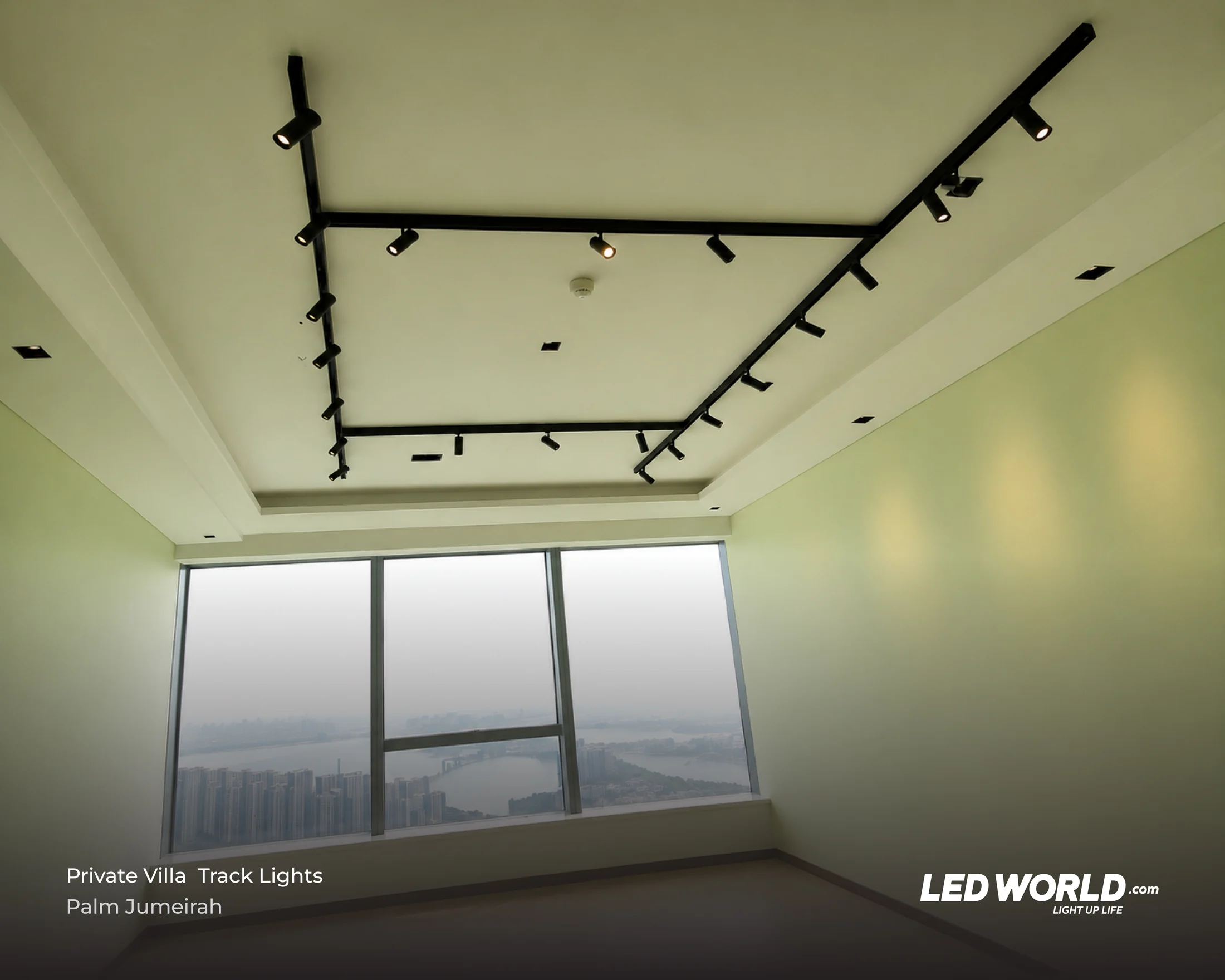 Black ceiling tracks and adjustable spotlights in a private villa at Palm Jumeirah, Dubai